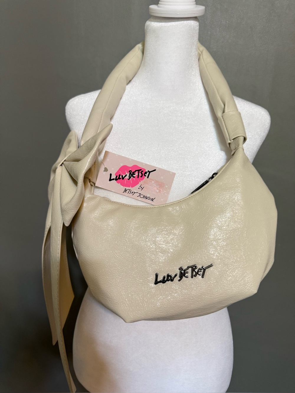 Luv Betsy Cream Shoulder Bag with Knotted Strap and bow on side. NWT